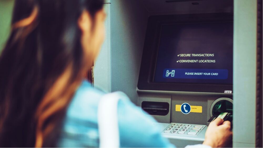 Woman_Bank_ATM_Card